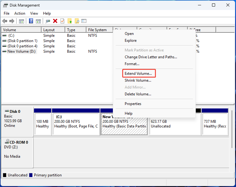 Disk Management interface with the selected Extend Volume option.