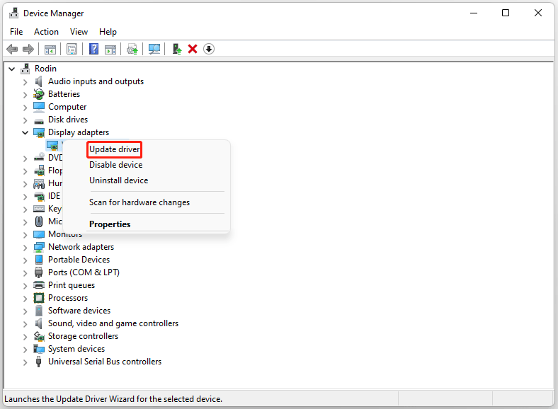 The Device Manager window with the Update driver option selected.