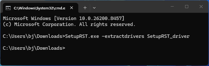 The CMD interface showing the command to extract drivers from the RST app.