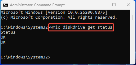 Command Prompt window with the wmic diskdrive get status command.