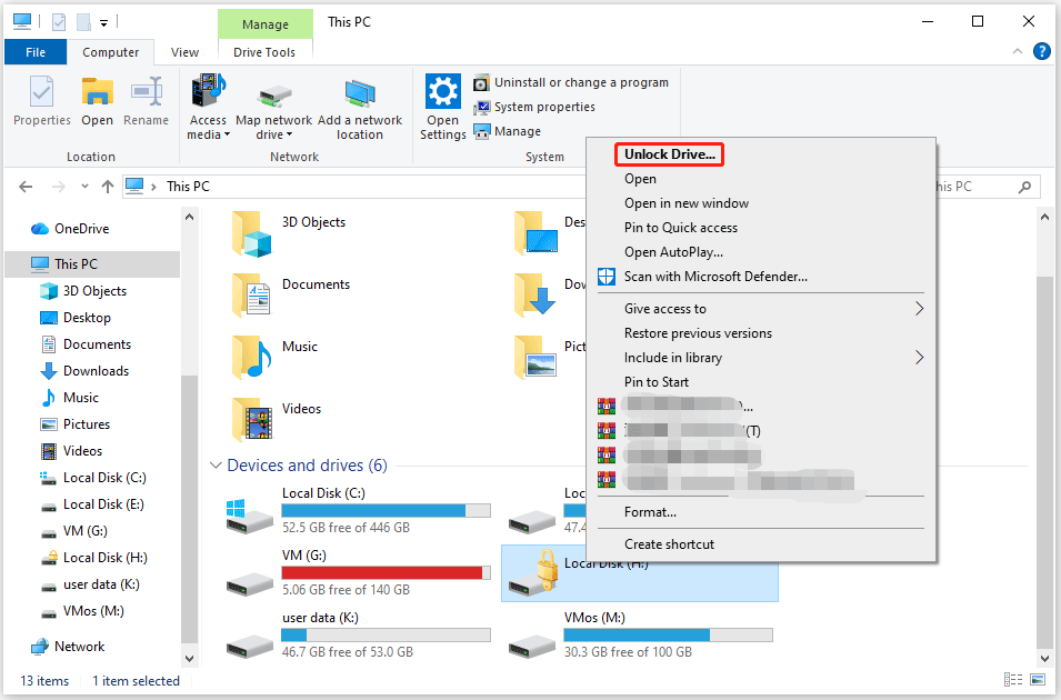 The File Explorer window with the Unlock Drive option selected.