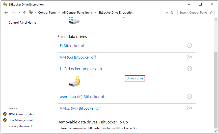 The BitLocker Drive Encryption window with the Unlock drive option selected.