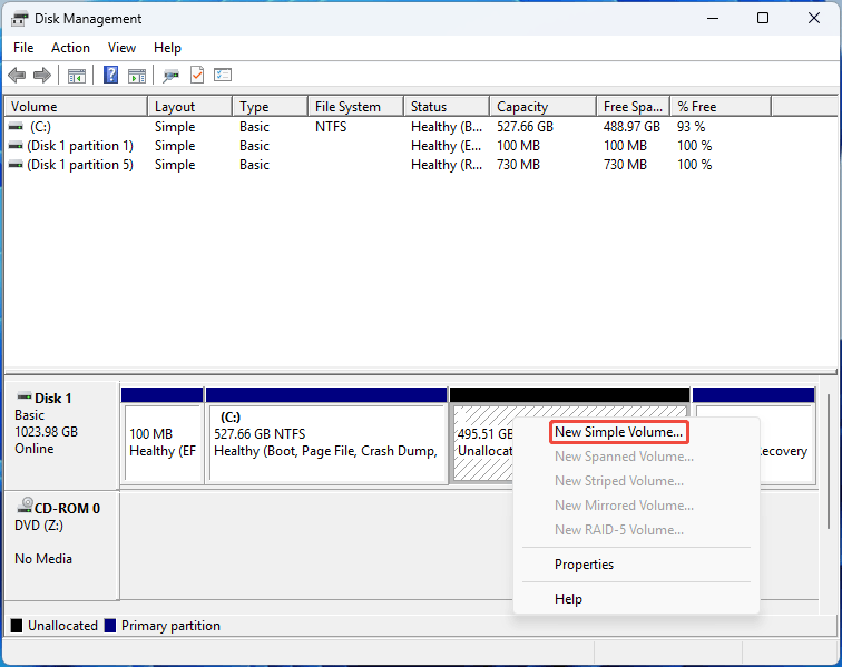 Disk Management interface with the selected New Simple Volume option.