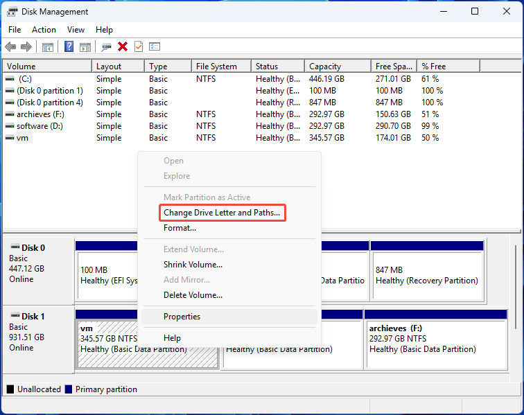 Disk Management interface with the selected Change Drive Letter and Path option.