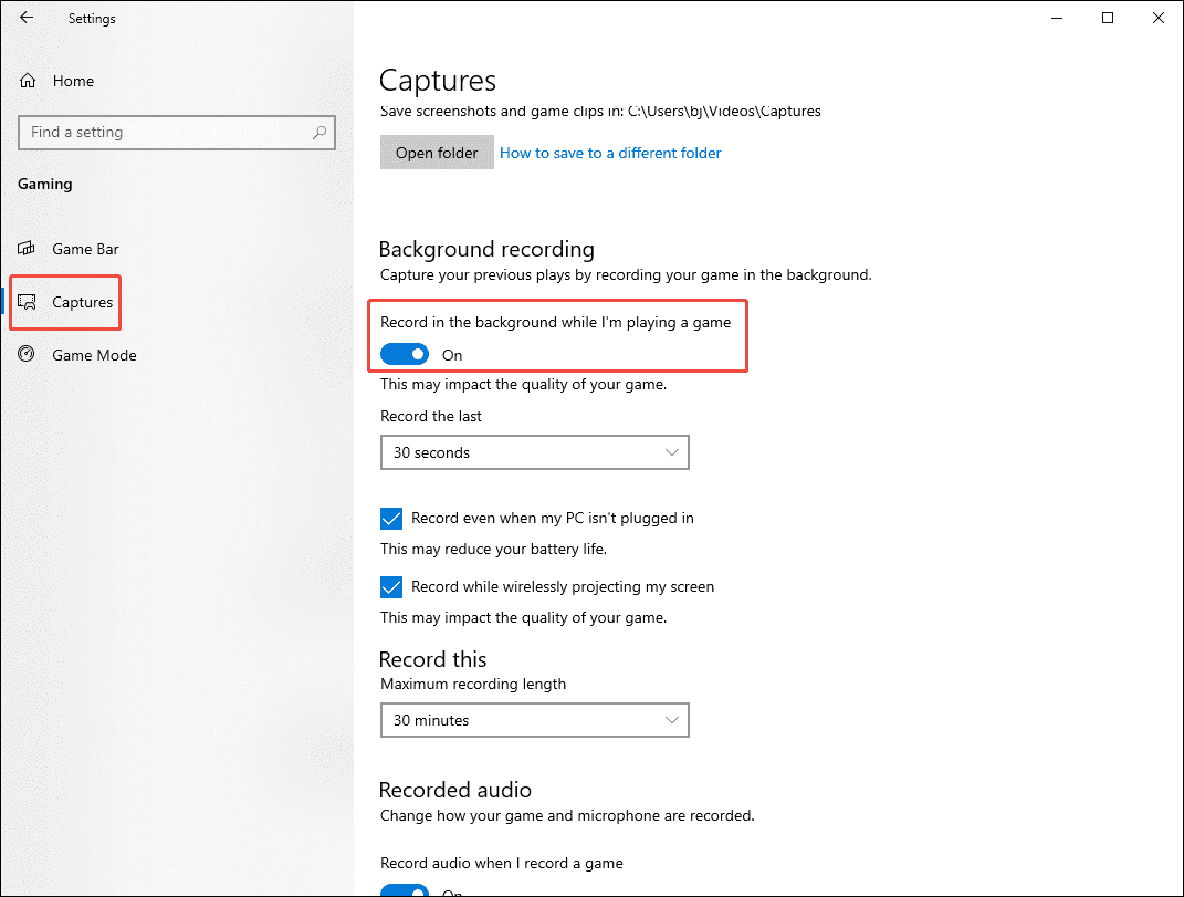 Windows Captures Settings interface with the Record in the background while I’m playing a game option enabled.