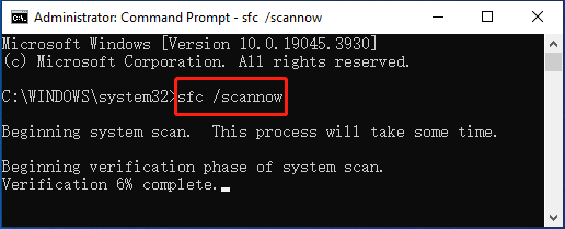 Windows Command Prompt with the SFC scannow command typed and running.