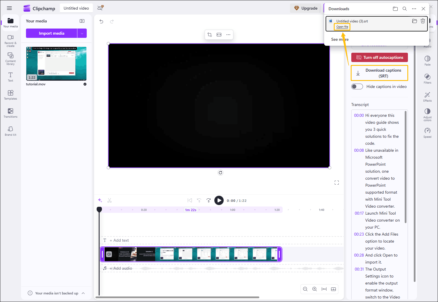 The Clipchamp interface with the Download caption (SRT) option and the Open file option highlighted