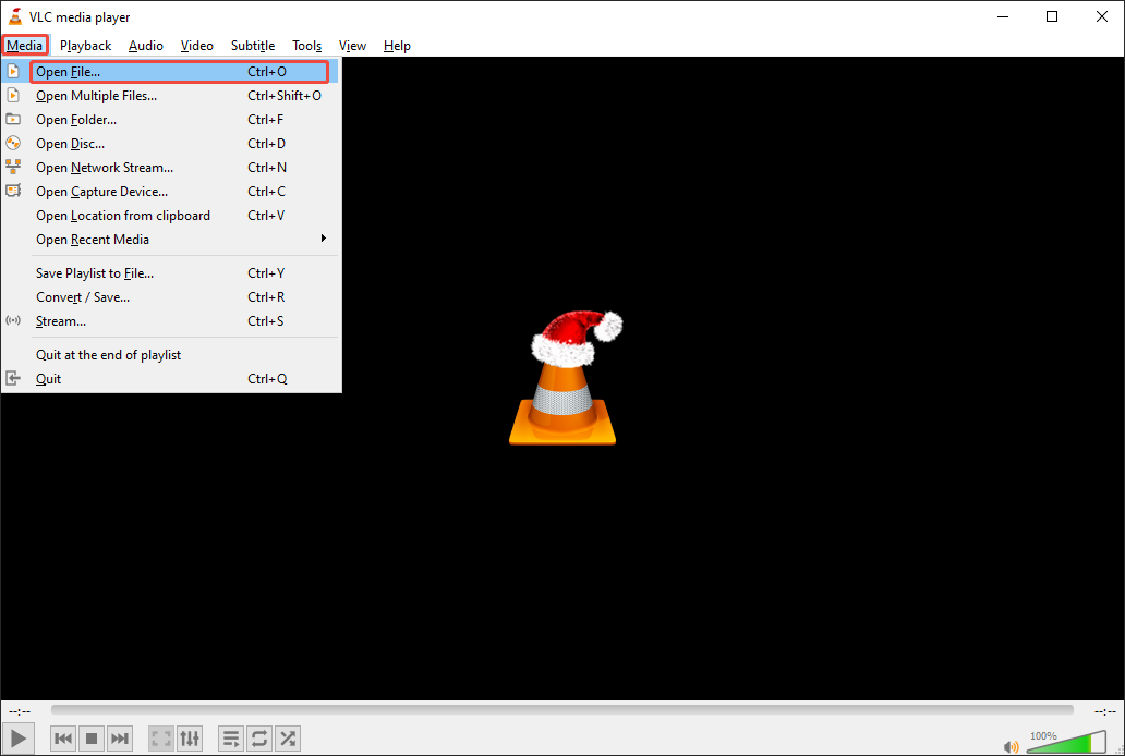 The VLC media player interface with the Media and Open File option selected to play XVID