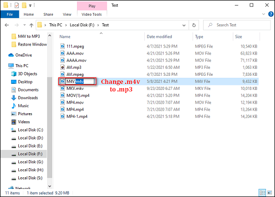 Windows File Explorer showing a file renamed from m4v to mp3 with a note indicating format change.