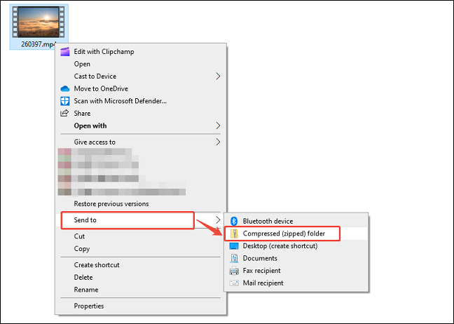 File Explorer window showing how to zip a file.