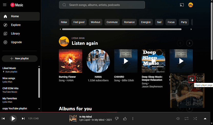 Click the Open player page icon in the mini player on YouTube Music