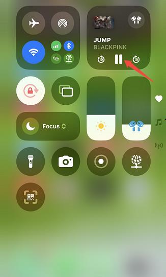 Click the play icon in your iPhone’s Control Center to play YouTube Music in background